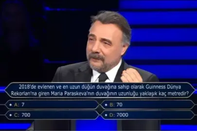 2018'de evlenen ve en uzun düğün duvağına sahip olarak Guinness Dünya Rekorları'na giren Maria Paraskeva'nın duvağının uzunluğu yaklaşık kaç metredir?